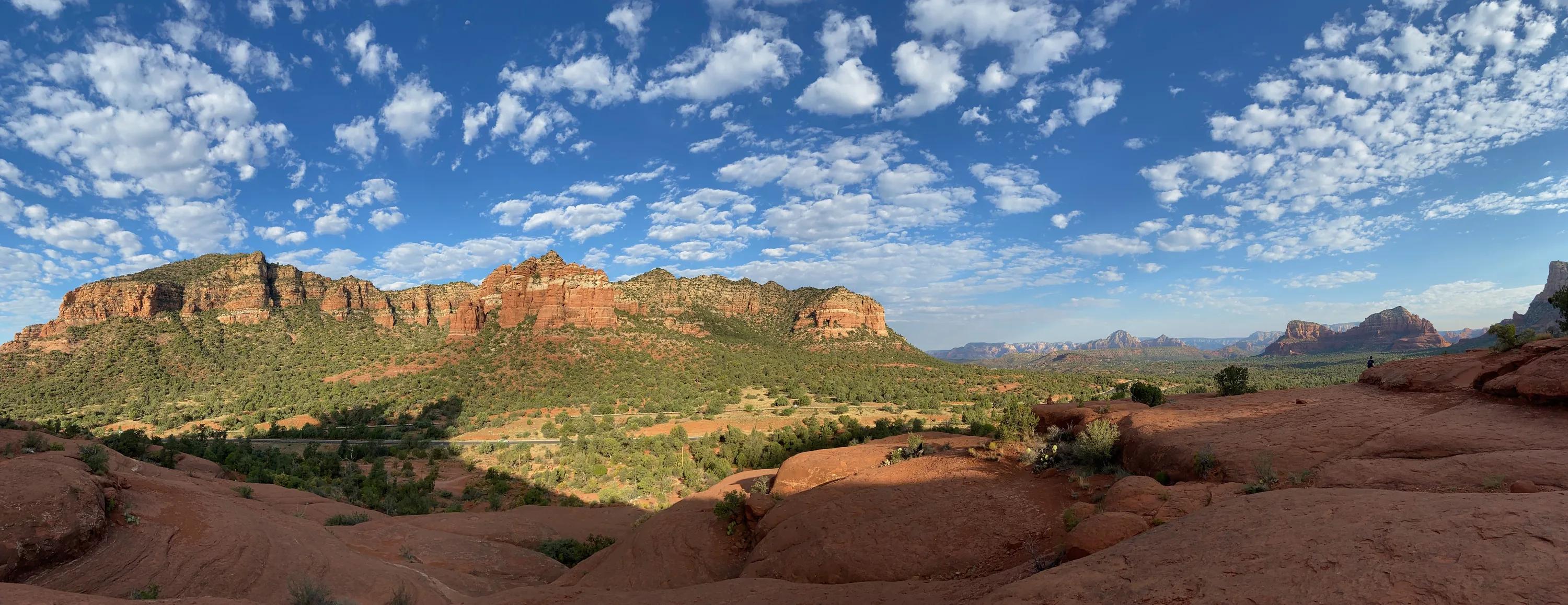 An expansive mountain landscape at golden hour